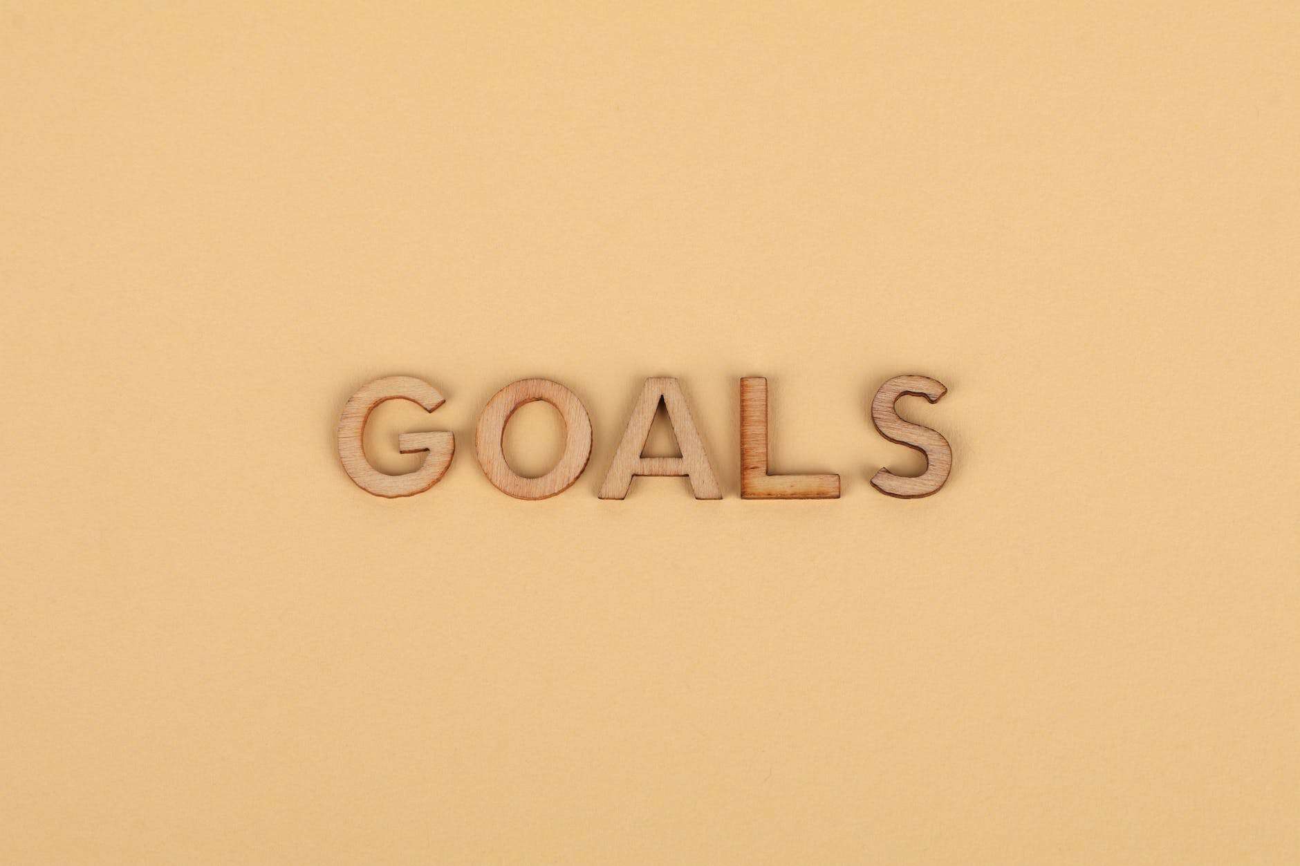 the word goals from wooden letters