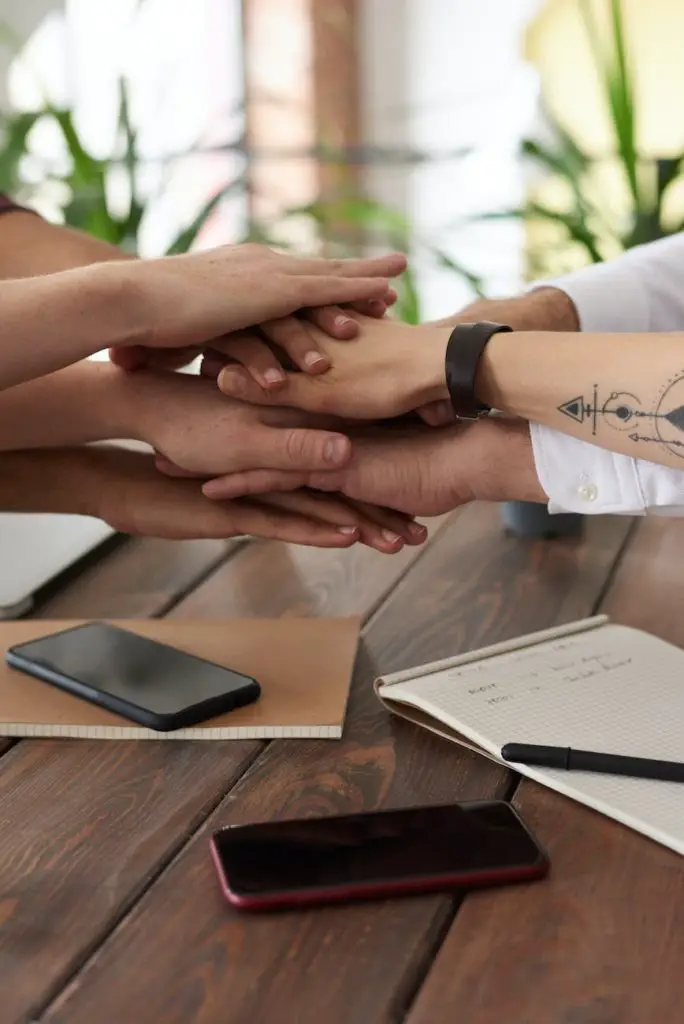 photo of people near wooden table