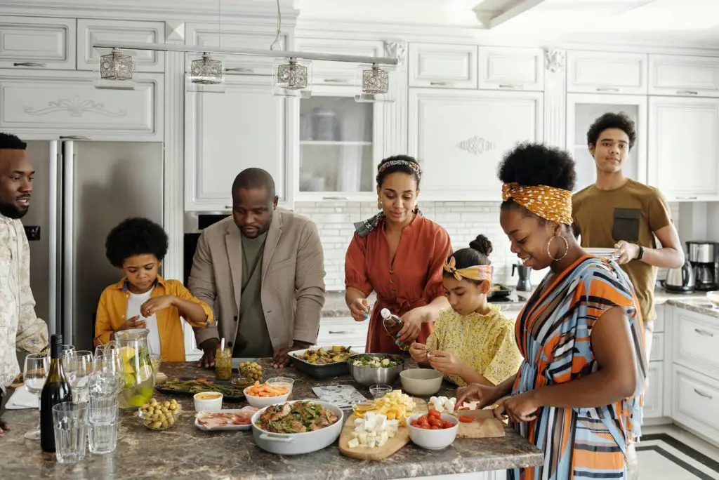 family preparing food in the kitchen